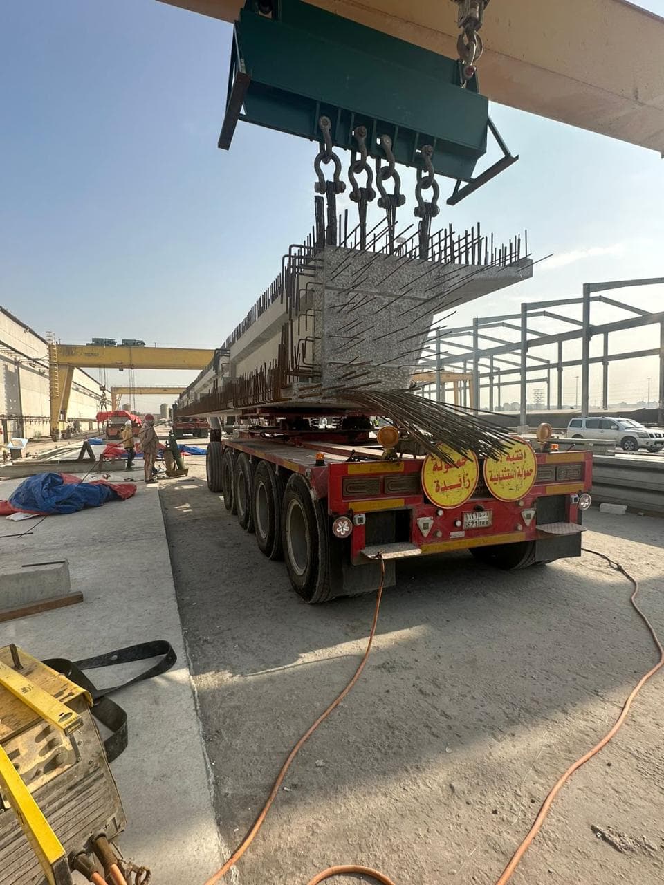 8-axle dolly lowbed carrying a precast concrete beam